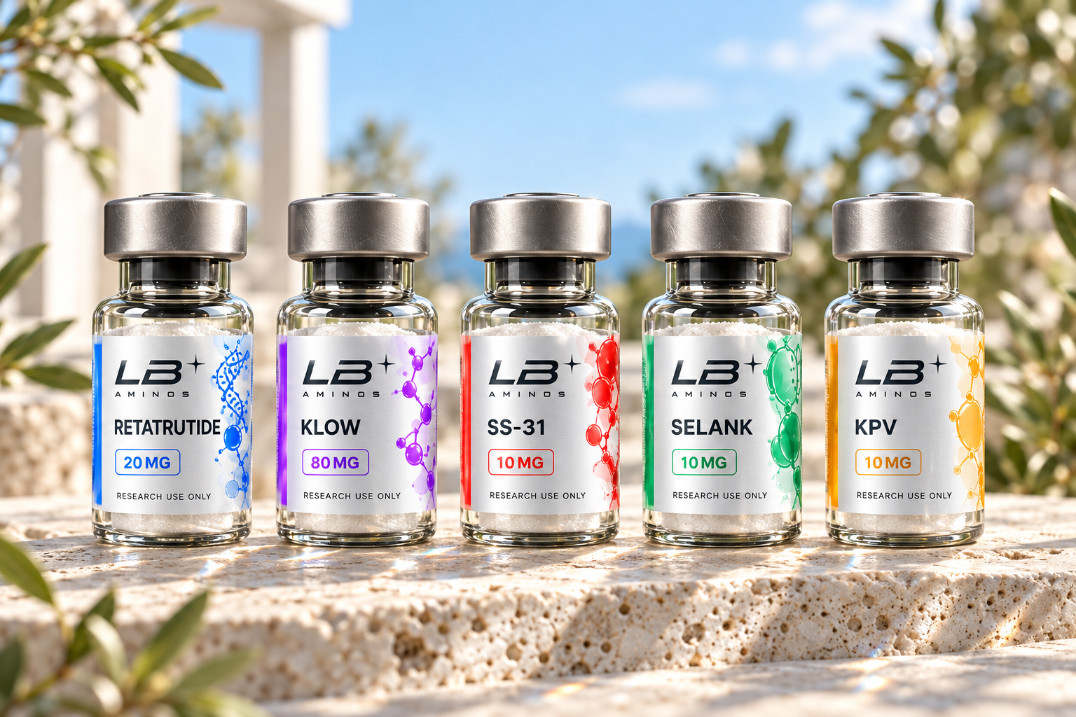 Five LB Aminos research vial mockups with silver caps and color-coded labels on sunlit stone